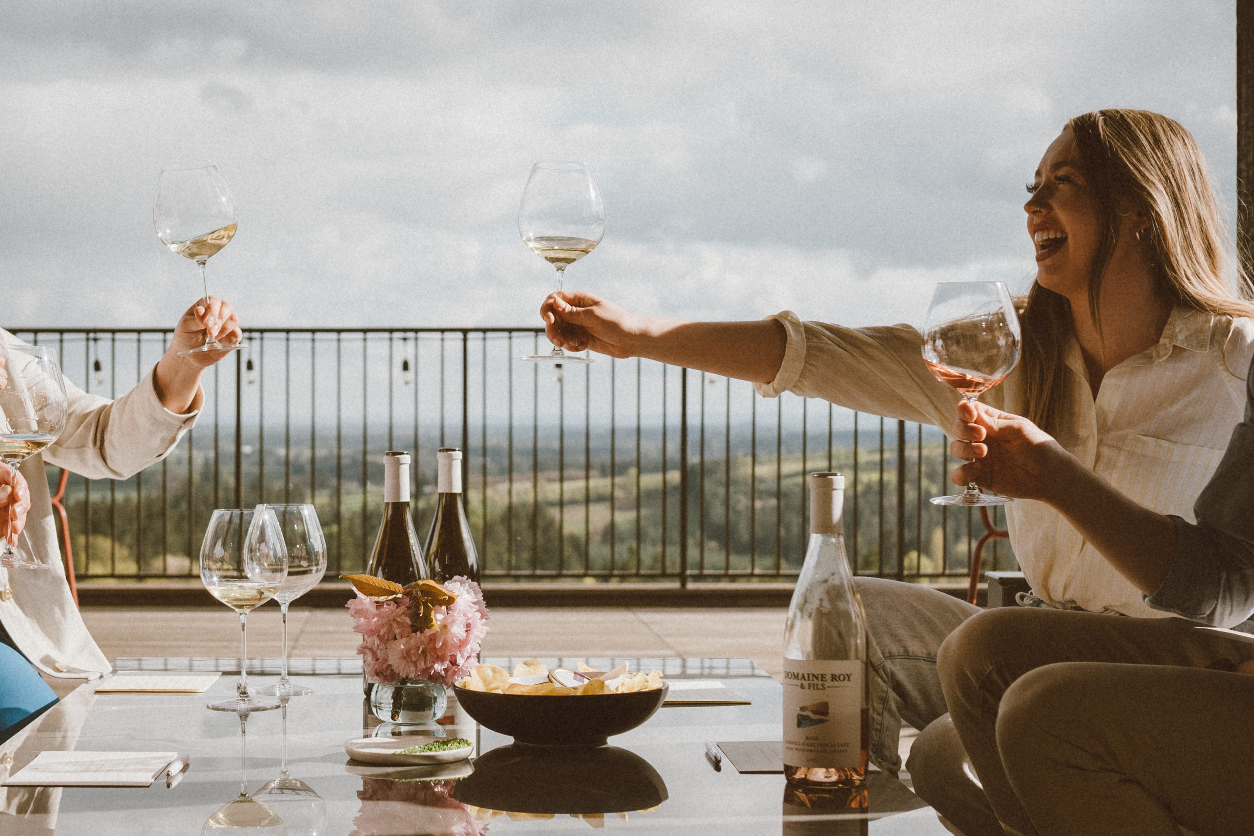 Guests Enjoying an Outdoor Tasting Experience at Domaine Roy & fils