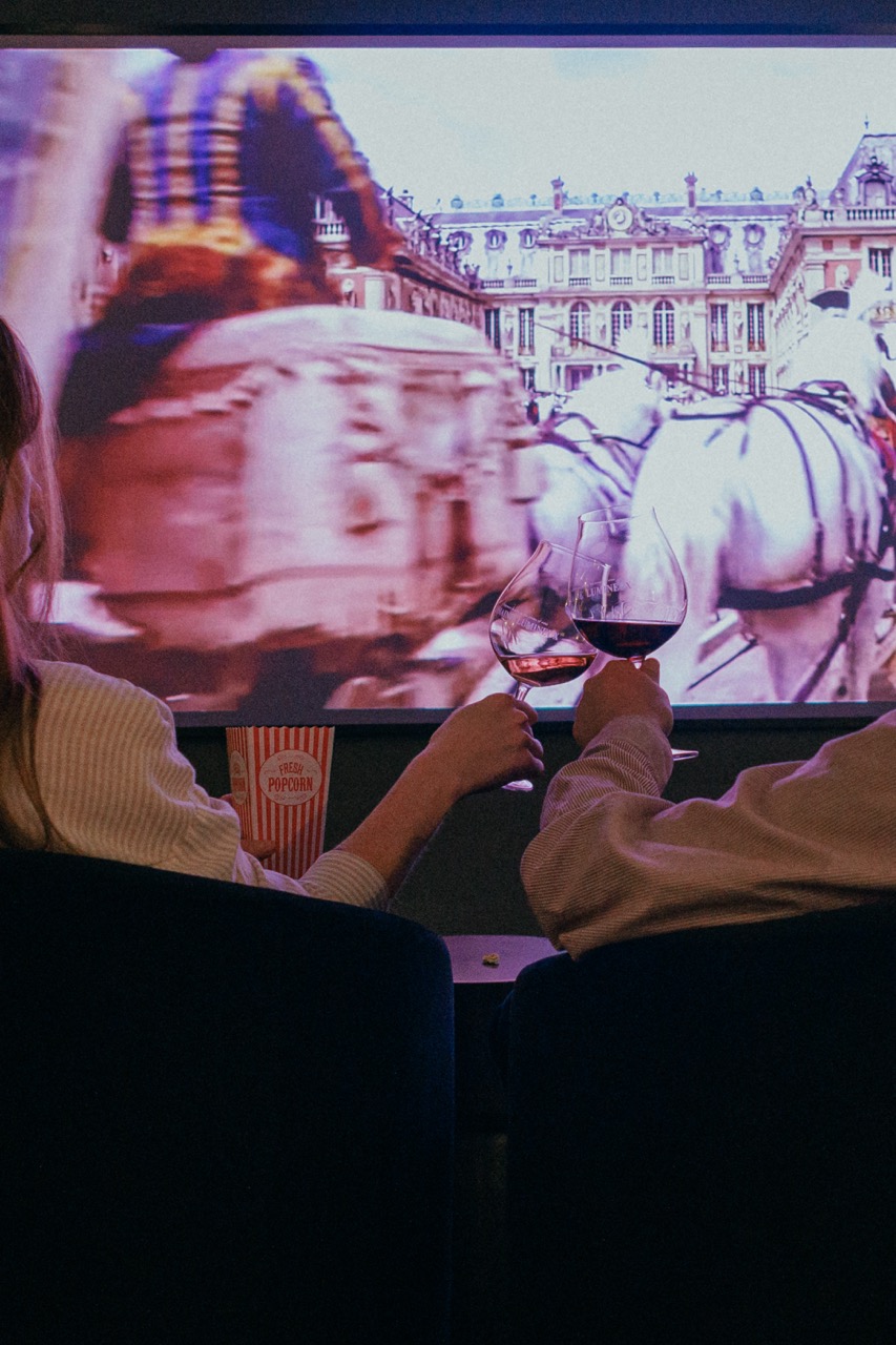 Two people at Domaine Lumineux Movie Night