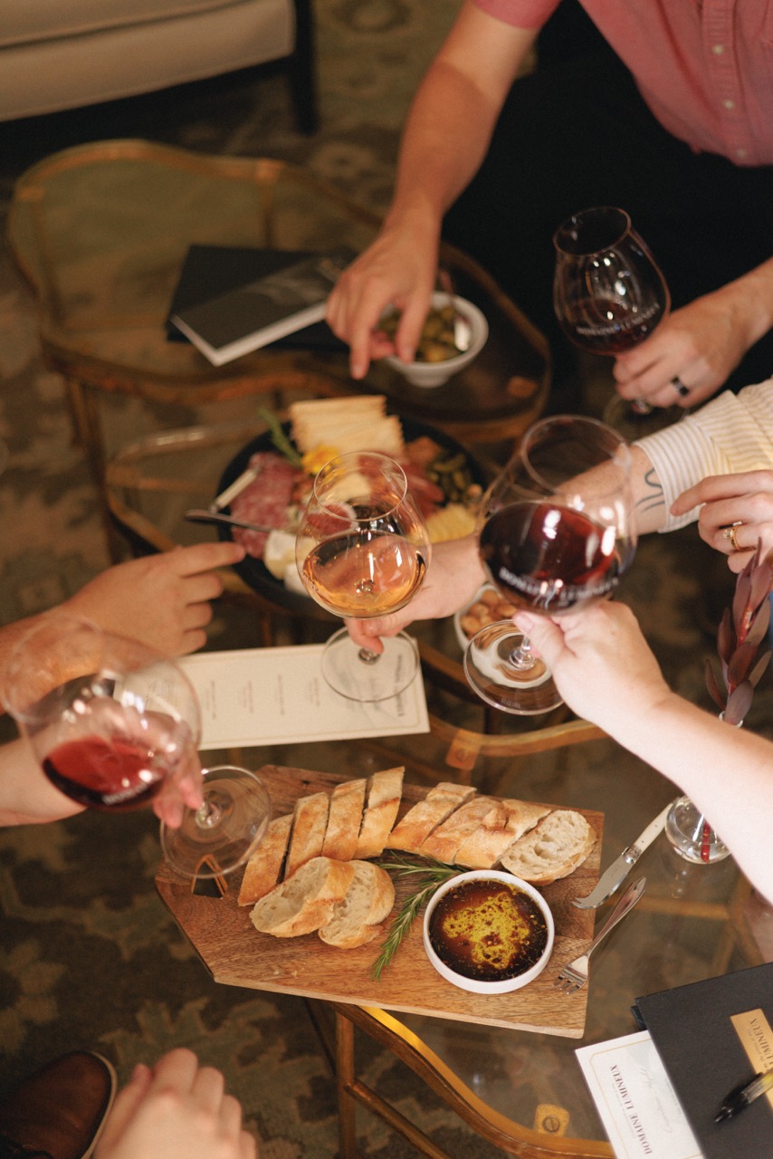People enjoying food at Domaine Lumineux