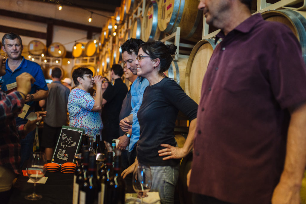 A crowded indoor wine tasting